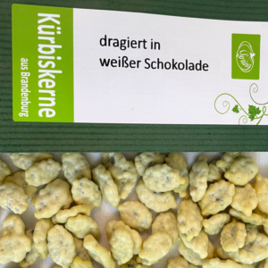 Kürbiskerne dragiert mit weißer Schoko